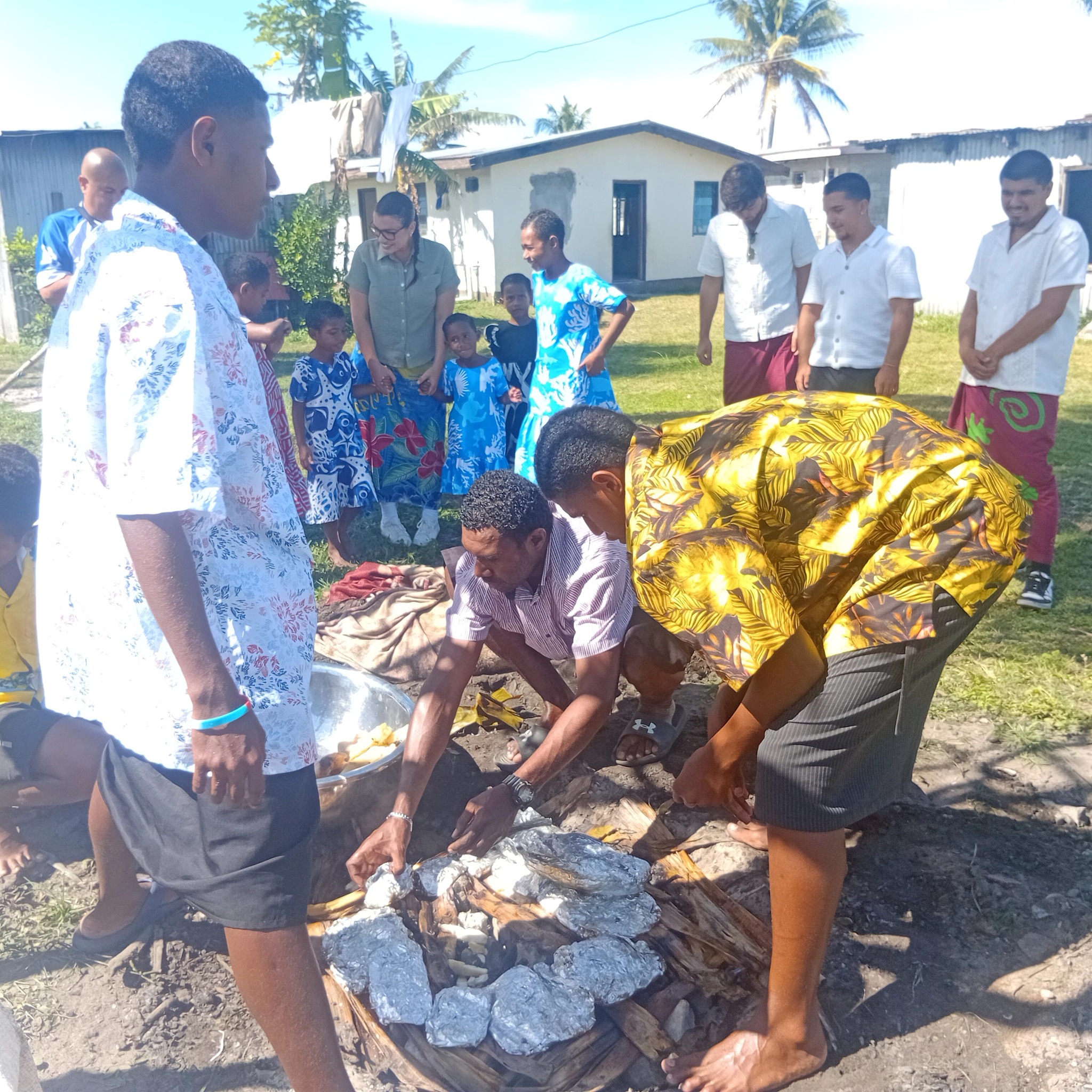 Traditional Fijian village with thatched-roof huts